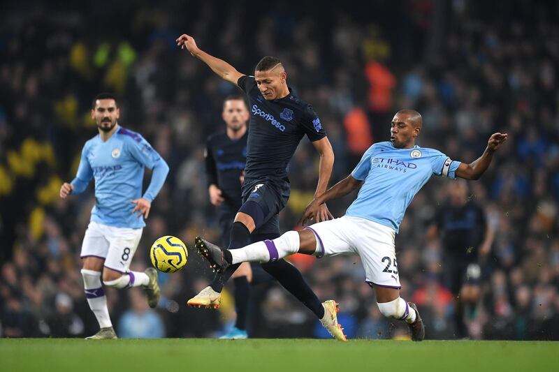 Fernandinho, right, will be at Manchester City until he is 36. Getty Images