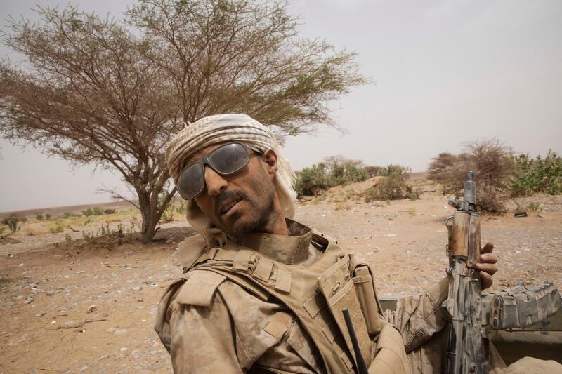A Yemeni fighter allied to government forces leaves the front lines in Marib. AP