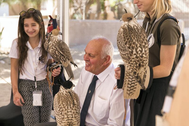 ABU DHABI, UNITED ARAB EMIRATES - DEC 6, 2017

Sandra Moravcíková, a 10 year old falconer from Slovakia, takes a photo with John Cooper, at the fourth International Festival of Falconry. 

John Cooper is one of the 27 falconers that were in Abu Dhabi in 1976 to receive Sheikh Zayed's invitation to falconers from around the world to convene in the desert of Abu Dhabi and build a strategy for the sport’s development.

(Photo by Reem Mohammed/The National)

Reporter: Anna Zacharias
Section: NA