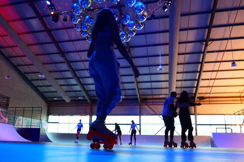 People doing roller skating at the RollDXB roller disco which opens at Shed 3 Marina Cubes Street, Dubai Maritime City, Port Rashid, Bur Dubai on April 25,2021. (Pawan Singh/The National). Story by Sophie Prideaux 