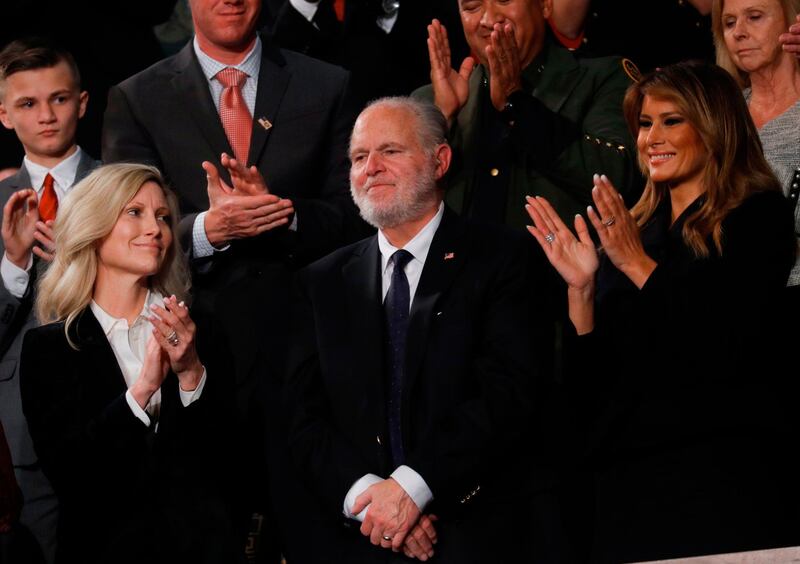 Radio personality Rush Limbaugh stands after being awarded the Medal of Freedom by First Lady Melania Trump during US President Donald Trump State of the Union address at the US Capitol in Washington, DC.  AFP