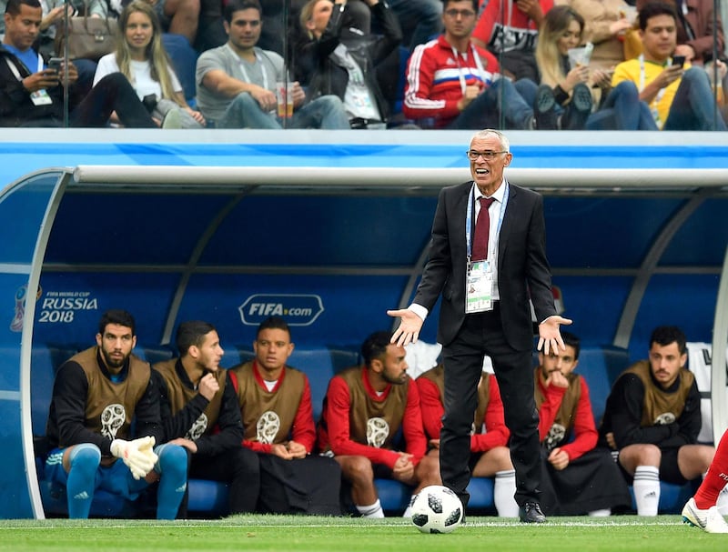 Egypt head coach Hector Cuper shouts during the group A match between Russia and Egypt at the 2018 soccer World Cup in the St. Petersburg stadium in St. Petersburg, Russia, Tuesday, June 19, 2018. (AP Photo/Martin Meissner)