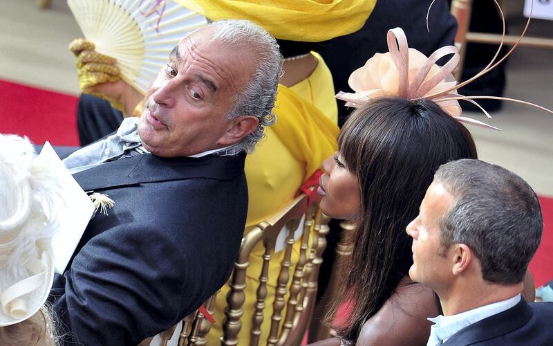 MONACO - JULY 02:, British businessman Sir Philip Green supermodel Naomi Campbell, and Russian businessman Vladislav Doronin attend the religious ceremony of the Royal Wedding of Prince Albert II of Monaco to Charlene Wittstock in the main courtyard at Prince's Palace on July 2, 2011 in Monaco, Monaco. The Roman-Catholic ceremony follows the civil wedding which was held in the Throne Room of the Prince's Palace of Monaco on July 1. With her marriage to the head of state of the Principality of Monaco, Charlene Wittstock will become Princess consort of Monaco and gain the title, Princess Charlene of Monaco. Celebrations including concerts and firework displays are being held across several days, attended by a guest list of global celebrities and heads of state.  (Photo by Pascal Le Segretain/Getty Images)