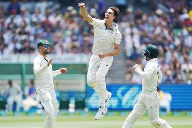 Pat Cummins (C) of Australia celebrates the wicket of Tom Latham of New Zealand on day three of the Boxing Day Test. EPA