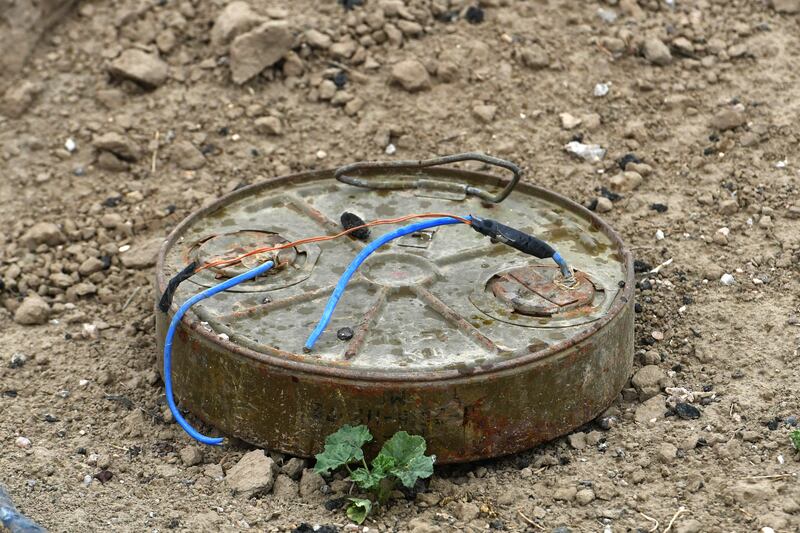 A discarded landmine in the village of Baghouz in Syria's eastern Deir Ezzor province in March 2019. AP