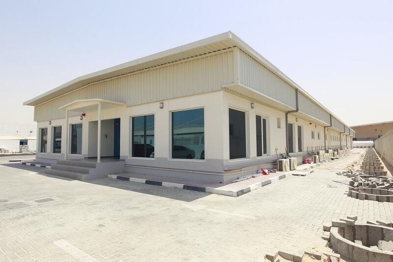 The new regional headquarters of cargo-inspection company Geochem has been built out of 42 shipping containers by Dubai company Smartbox. Jeffrey E Biteng / The National