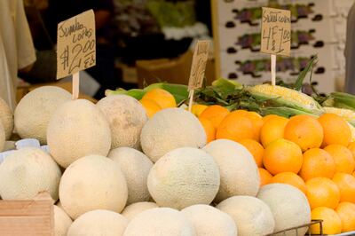 Melons, Oranges, and Sweetcorn at Farmers Market (iStockphoto.com)