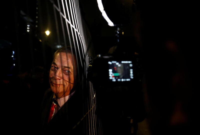 Brexit Party leader Nigel Farage speaks to the media before addressing crowds in Parliament Square. Reuters