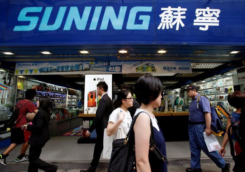 The Chinese electronics retailer is seeking deals to help to create a global sporting ‘ecosystem’. Bobby Yip / Reuters