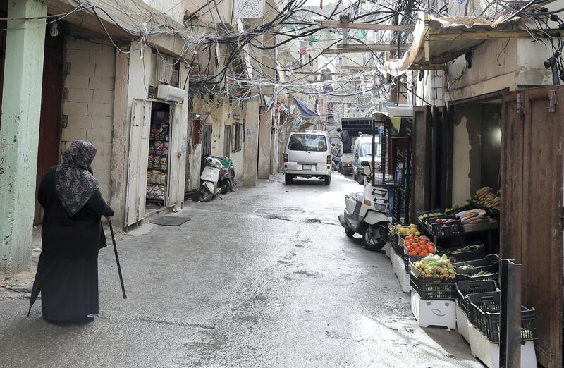 A Palestinian woman walks in the Burj al-Barajneh camp in the Lebanese capital Beirut on January 17, 2018. - The UN agency for Palestinian refugees warned it faced its worst funding crisis ever after the White House froze tens of millions of dollars in contributions, a move Palestinian leaders decried as cruel and blatantly biased. (Photo by JOSEPH EID / AFP)