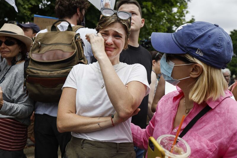 Abortion rights activists react to the announcement of the US Supreme Court ruling on June 24 in Washington. AFP