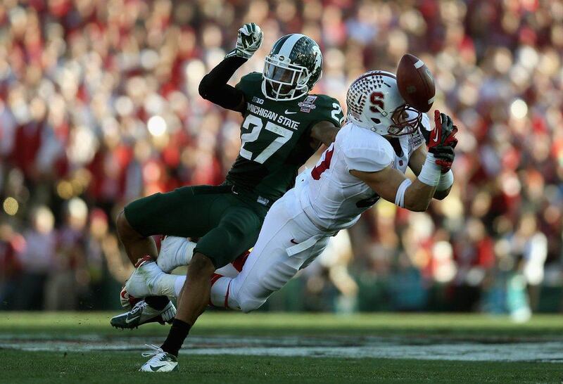 Wide receiver Devon Cajuste, right, of Stanford is unable to make a catch against safety Kurtis Drummond of Michigan State during the 100th Rose Bowl Game at the Rose Bowl on Wednesday in Pasadena, California. Jeff Gross/AFP