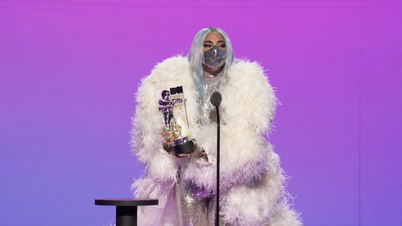 Lady Gaga accepts the award for Song of the Year for 'Rain on Me' during the 2020 MTV VMAs. Reuters