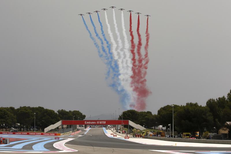 The French Air Force Patrouille de France team fly over the track ahead of the French GP. EPA
