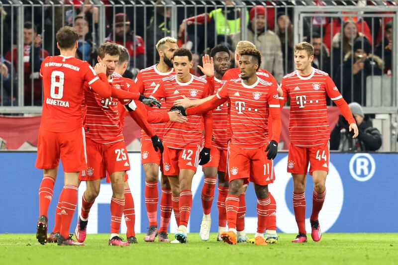 Bayern Munich players celebrate after Bayern's Kingsley Coman, second right, scored his side's second goal during the Bundesliga soccer match between Bayern Munich and Union Berlin at the Allianz Arena in Munich, Germany, Sunday, Feb. 26, 2023.  (AP Photo / Alexandra Beier )