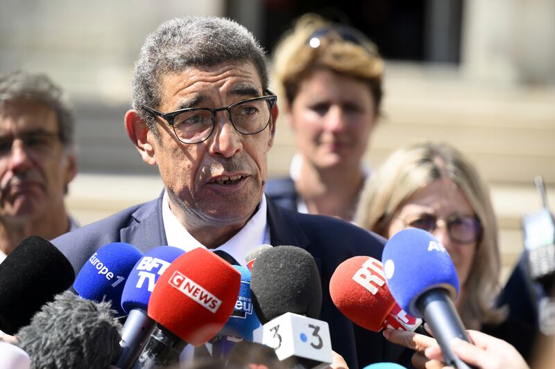 Annecy Mayor Francois Astorg addresses the media following the attack. AP