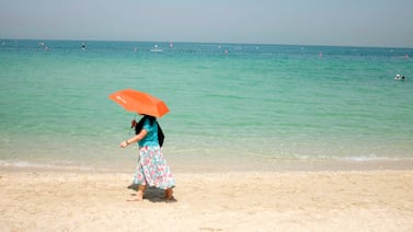 UAE residents can expect cooler temperatures in November but may need an umbrella for rain rather than the glare of the sun. Antonie Robertson / The National