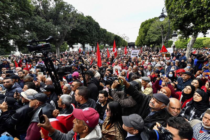 Supporters of opposition groups march in the Tunisian  capital, Tunis. AFP