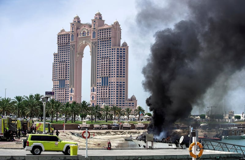 Abu Dhabi, United Arab Emirates, May 19, 2020.    
 A fire breaks out on a boat at the Marina Mall area.
VB / The National
Section:  NA
Reporter:  Haneen Dajani