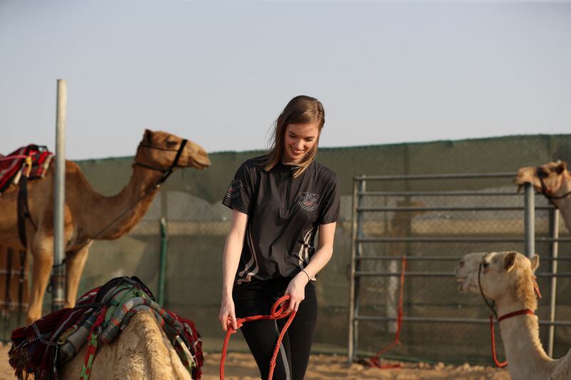 Katie Higgins is part of the first all-female camel racing team in the UAE. Chris Whiteoak / The National