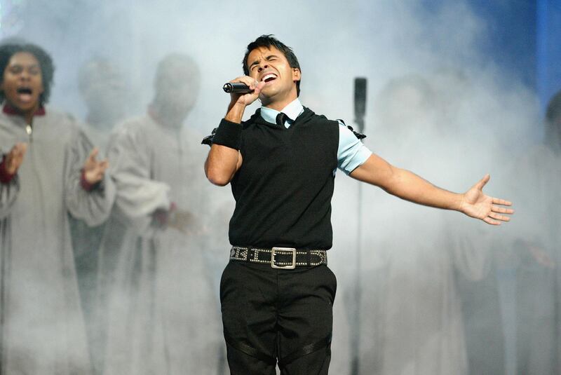 MIAMI - APRIL 29:  Singer Luis Fonsi performs during the 2004 Billboard Latin Music Awards at the Miami Arena April 29, 2004 in Miami, Florida.  (Photo by Alberto Tamargo/Getty Images) 