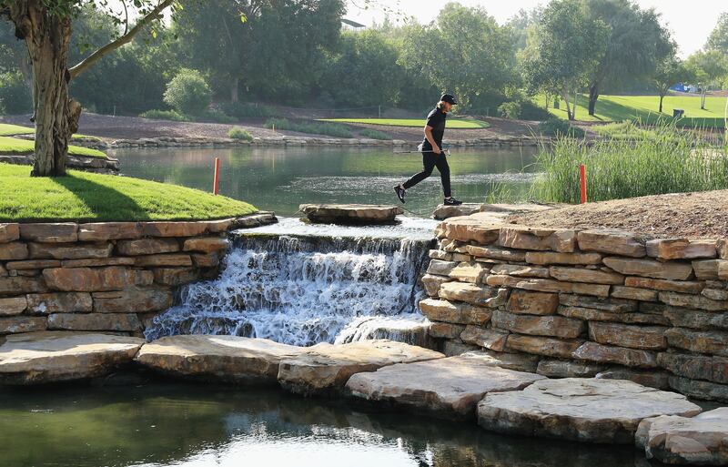 Tommy Fleetwood of England walks off the 6th green. The DP World Tour Championship takes place on November 16-19. Andrew Redington / Getty Images