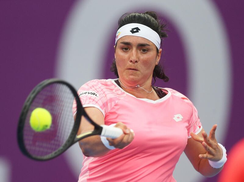 DOHA, QATAR - MARCH 02:  Ons Jabeur of Tunisia returns a forehand during the Women's Singles match between Ons Jabeur and Anna Blinkova on Day Two of the WTA Qatar Total Open at Khalifa International Tennis and Squash Complex on March 02, 2021 in Doha, Qatar. (Photo by Mohamed Farag/Getty Images)