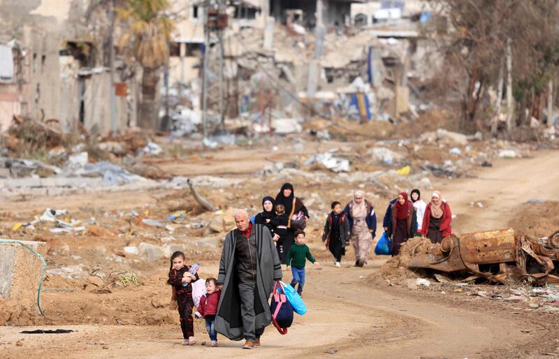 Palestinians flee from the southern outskirts of Gaza City last November. AFP