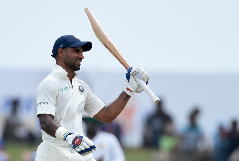 Shikhar Dhawan was bound for Melbourne to spend time with his family, but instead finds himself in the thick of action in his India whites. Ishara Kodikara / AFP