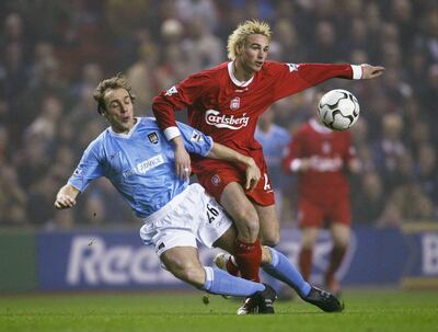 Anthony Le Tallec, right, is a former professional footballer who played for Liverpool. Getty Images