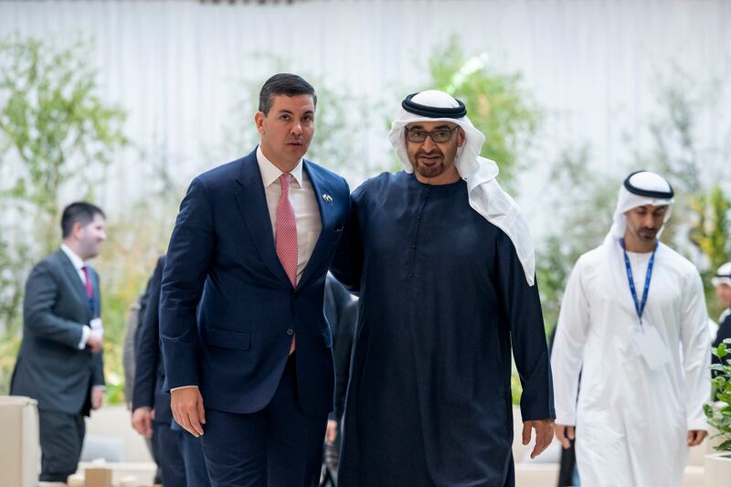 President Sheikh Mohamed receives Santiago Pena, President of Paraguay, at Cop28. Photo: UAE Presidential Court 