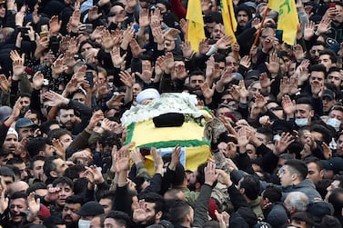 Hezbollah members and relatives carry the coffin of one of the fighters killed in Idlib, Syria, during a funeral procession in the southern suburb of Beirut, Lebanon. EPA