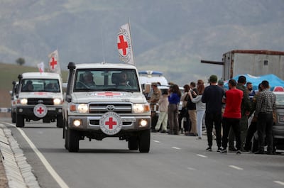 The International Committee of the Red Cross drive past an Armenian checkpoint on the way out of Nagorno-Karabakh. Reuters