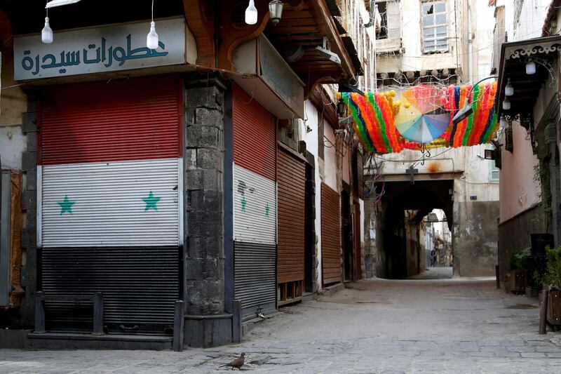 FILE PHOTO: A view shows closed shops as part of the preventive measures against the spread of the coronavirus disease (COVID-19), in the old city of Damascus, Syria March 24, 2020. Picture taken March 24, 2020. REUTERS/Yamam Al Shaar/File Photo