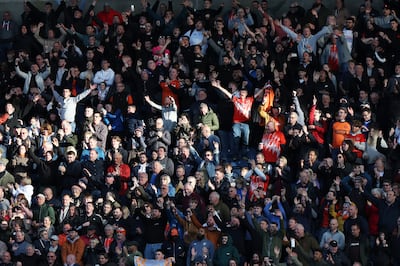 Luton Town fans have been through plenty of tough times but will cheer on their team in the Championship play-offs. Getty