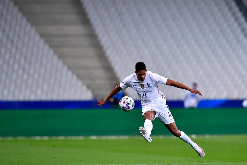 PARIS, FRANCE - JUNE 08: Raphael Varane of France kicks the ball during the international friendly match between France and Bulgaria at Stade de France on June 08, 2021 in Paris, France. (Photo by Aurelien Meunier/Getty Images)