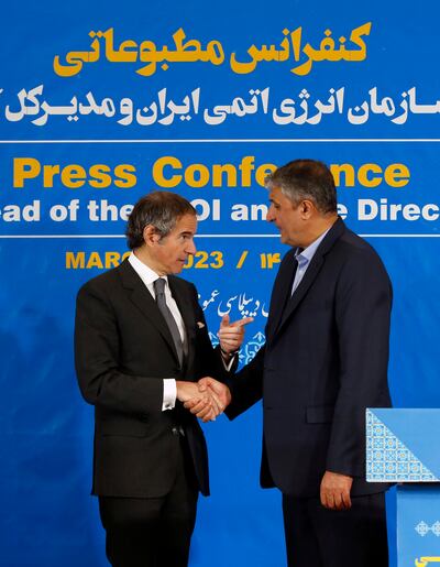 Head of Iran Atomic Energy Organisation Mohammad Eslami, right, with International Atomic Energy Agency chief Rafael Grossi in Tehran. EPA