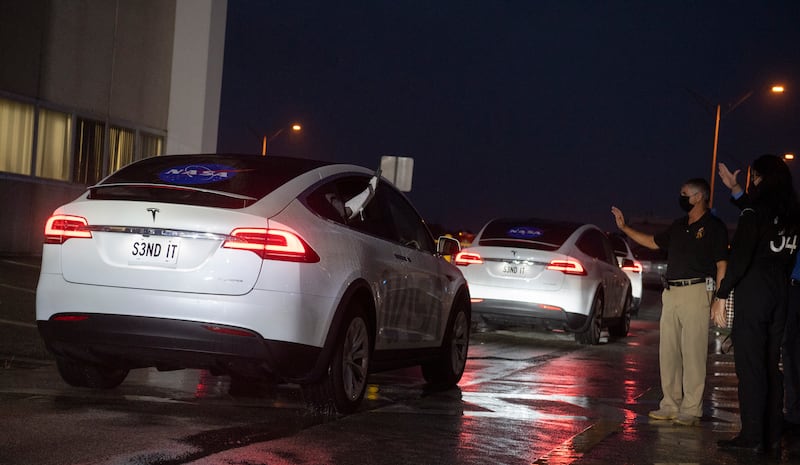 The Crew-3 astronauts head to the launch pad in a convoy of Tesla cars. EPA / Joel Kowsky  /  NASA  /  HANDOUT