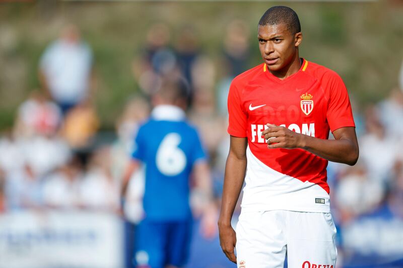 epa06089885 AS Monaco's Kylian Mbappe looks on during a friendly soccer match between AS Monaco and Stoke City FC, in Martigny, Switzerland, Saturday, July 15, 2017.  EPA/VALENTIN FLAURAUD