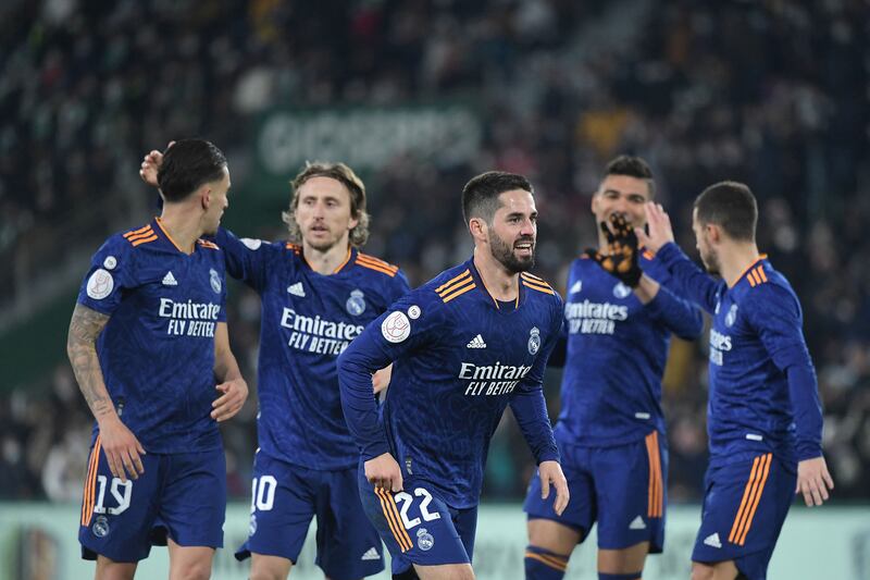 Real Madrid's Isco celebrates with teammates after scoring. AFP