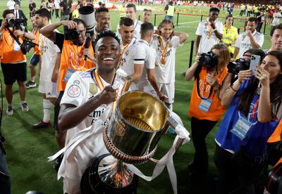 Real Madrid's Vinicius celebrates after winning the Copa del Rey. Reuters