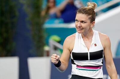 Mar 25, 2019; Miami Gardens, FL, USA; Simona Halep of Romania celebrates after match point against Venus Williams of the United States (not pictured) in the fourth round of the Miami Open at Miami Open Tennis Complex. Mandatory Credit: Geoff Burke-USA TODAY Sports