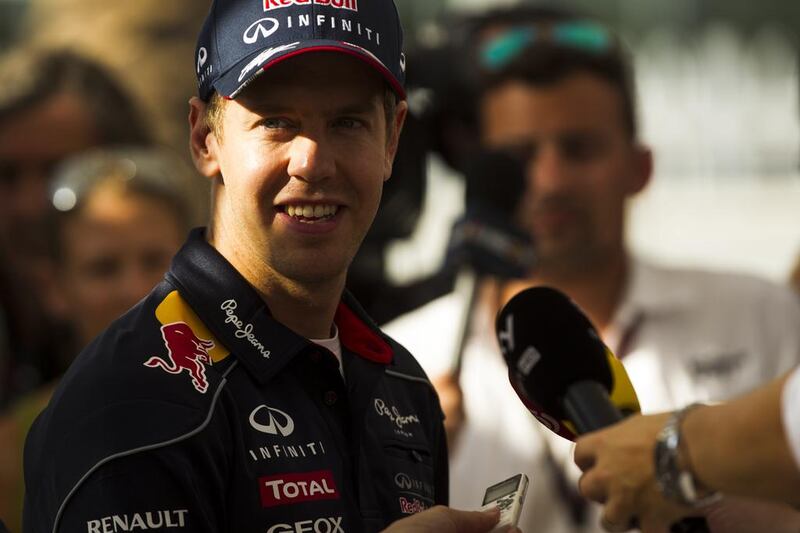 Why shouldn't Sebastian Vettel smile. He and Red Bull Racing have now won four consecutive driver and manufacturer titles. Christopher Pike / The National