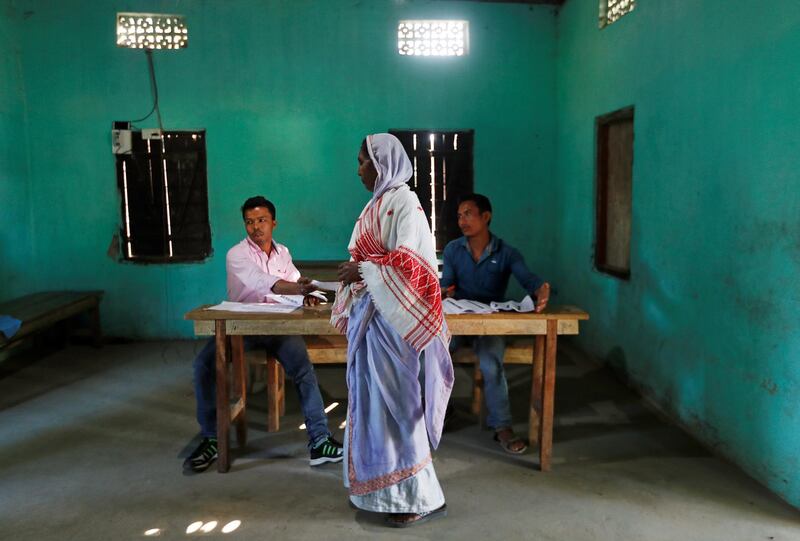 A woman arrives to cast her vote at a polling station in Majuli, a large river island in the Brahmaputra river, in the northeastern Indian state of Assam. Reuters
