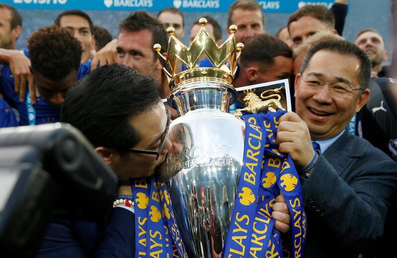 Leicester City chairman Vichai Srivaddhanaprabha, right, with the Premier League trophy which the club won in 2016. Action Images via Reuters