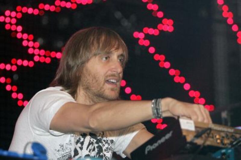 French DJ David Guetta performs during "One Love" world tour at the "Litexpo" palace in 2010, in Lithuania.