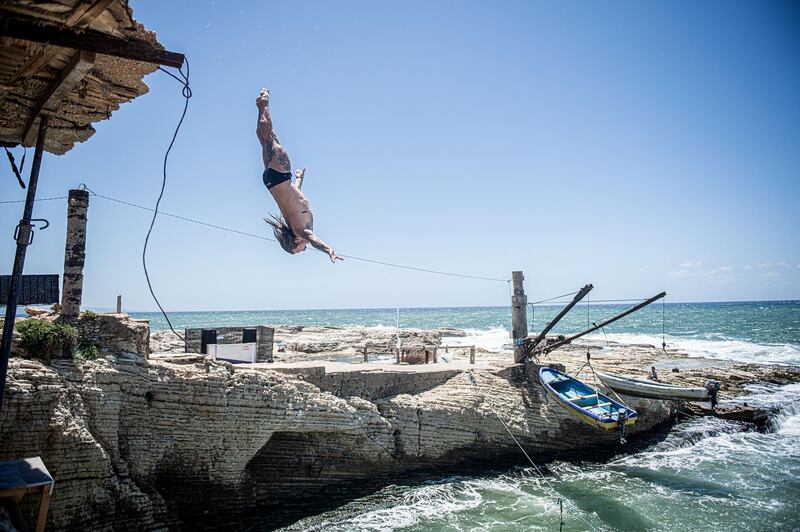 Matthias Appenzeller of Switzerland dives from a 10m training platform during the first competition day of the fifth stop of the Red Bull Cliff Diving World Series. Getty Images