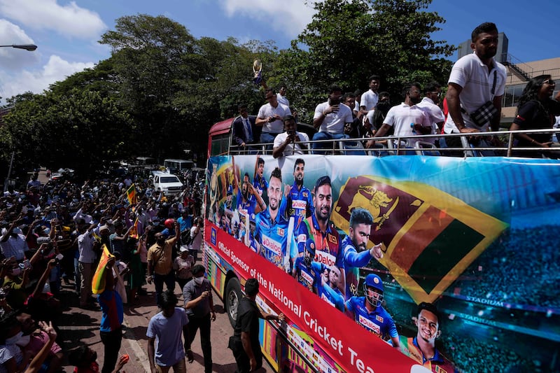 Sri Lanka's Asia Cup winners are greeted by fans in Colombo. AP