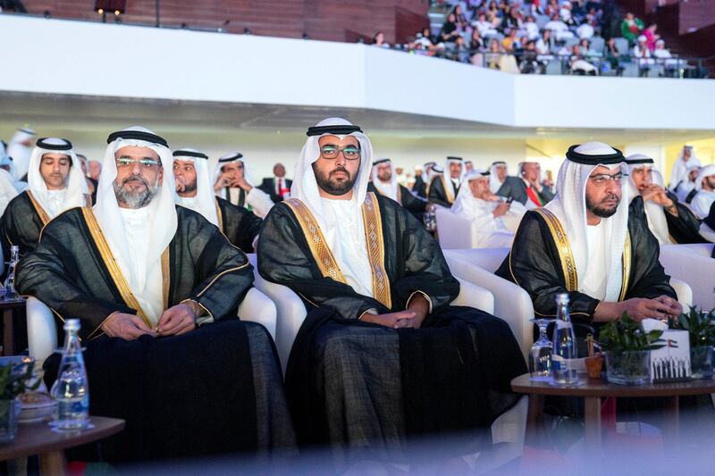 ABU DHABI, UNITED ARAB EMIRATES - December 02, 2019: (R-L) HH Sheikh Sultan bin Mohamed Al Qasimi, Crown Prince of Sharjah, HH Sheikh Rashid bin Saud bin Rashid Al Mu'alla, Crown Prince of Umm Al Quwain and HH Sheikh Hamdan bin Zayed Al Nahyan, Ruler’s Representative in Al Dhafra Region watch the performance of ‘Legacy of Our Ancestors’ during the 48th UAE National Day celebrations, at Zayed Sports City.

( Ryan Carter for the Ministry of Presidential Affairs )
---