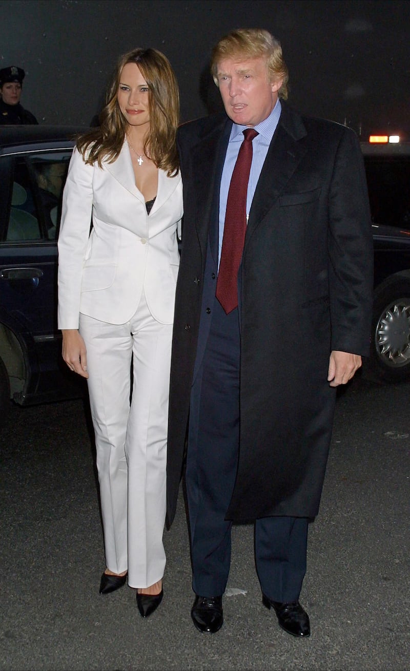 387976 12: Business tycoon Donald Trump and his girlfriend Melania Knauss arrive for the premiere of "Moulin Rouge" April 17, 2001 at the Paris Theatre in New York City. (Photo by George De Sota/Newsmakers)